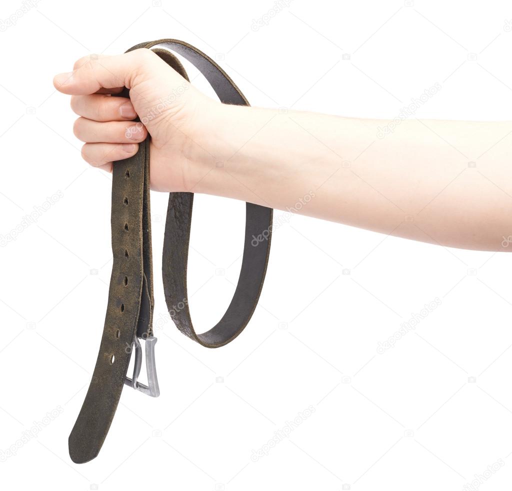 Hand holding black leather belt