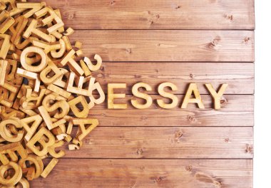 Word essay made with wooden letters clipart