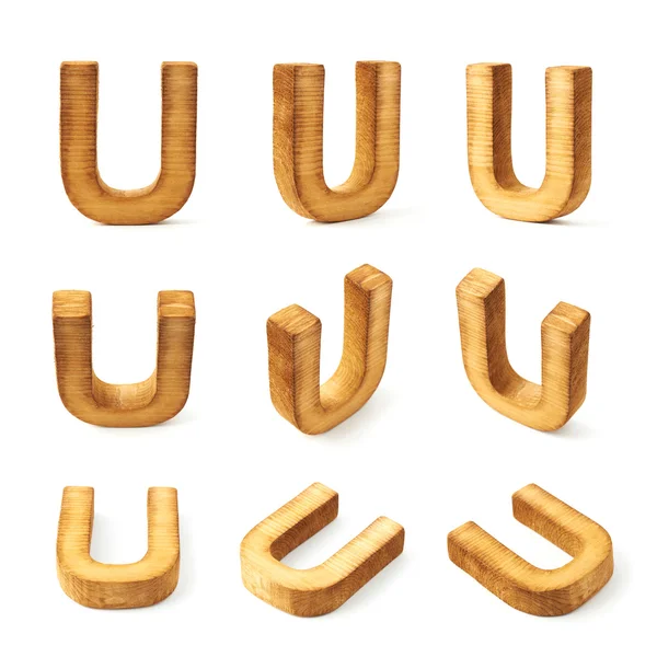 Девять деревянных букв U — стоковое фото