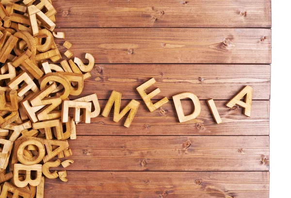 Word media made with wooden letters — Stock Photo, Image