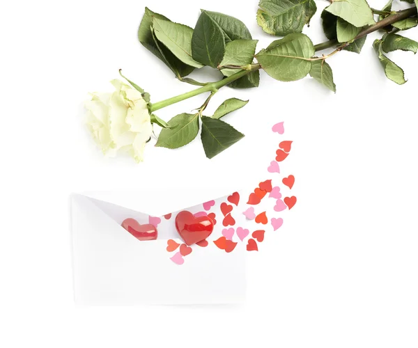 Rosa e envelope cheio de corações — Fotografia de Stock