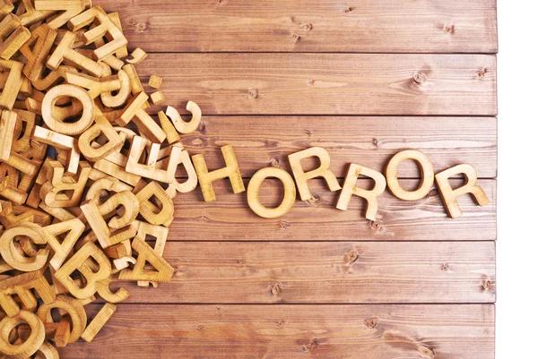 Ordet skräck med trä bokstäver — Stockfoto