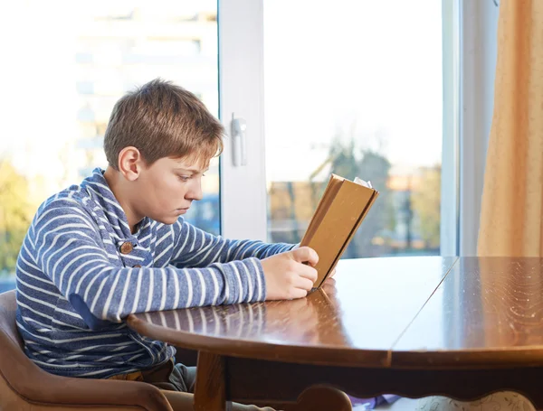 Boy  studying and reading a book — Stock Photo, Image