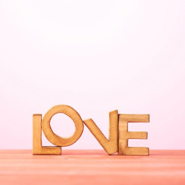 Love composition of wooden letters clipart