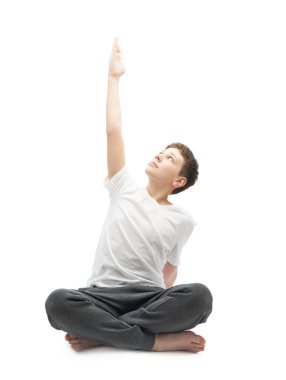 Germe veya yoga yaparken genç çocuk