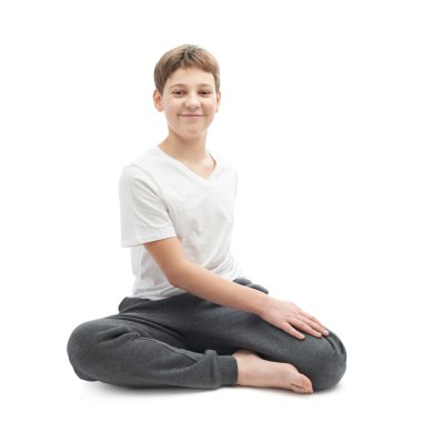 Germe veya yoga yaparken genç çocuk