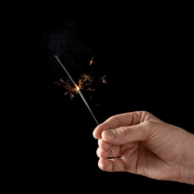 Yanan bir maytap holding