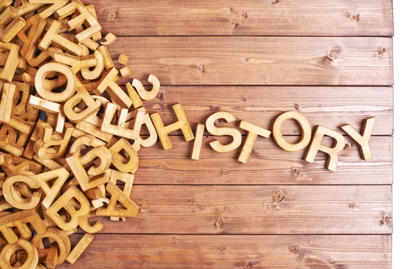 Історія слова, зроблена з дерев'яних літер — стокове фото