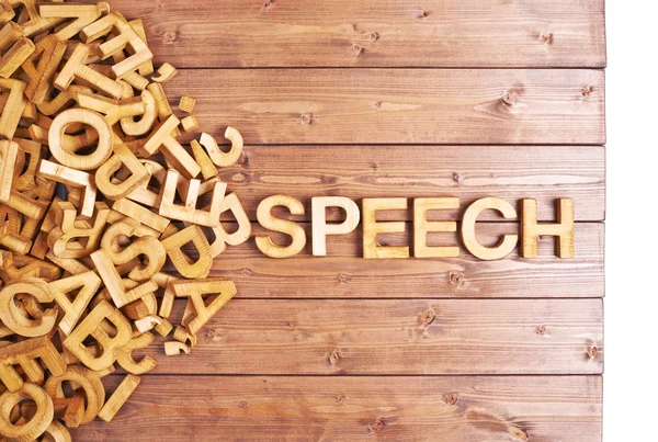 Slovo řeč s dřevěnými dopisy — Stock fotografie