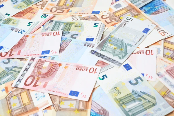 Euro banka notları ile kaplı yüzey — Stok fotoğraf