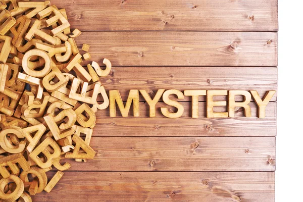 Mot mystère fait avec des lettres en bois — Photo