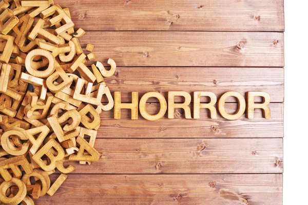 Word horror gemaakt met houten letters — Stockfoto