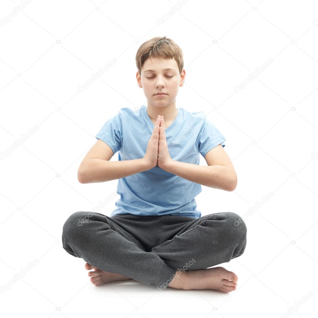 Young boy doing yoga