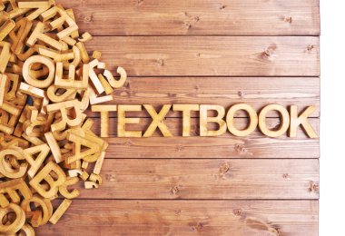 Ahşap harflerle yapılan kelime ders kitabı