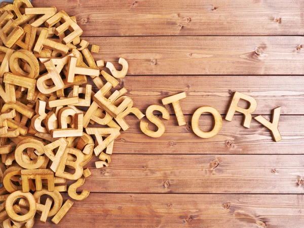 Word story made with wooden letters — Stock Photo, Image