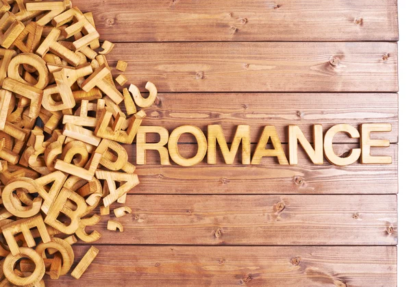 Parola romanticismo fatto con lettere di legno — Foto Stock