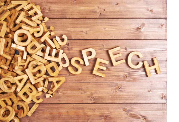 Wortmeldung mit Holzbuchstaben — Stockfoto