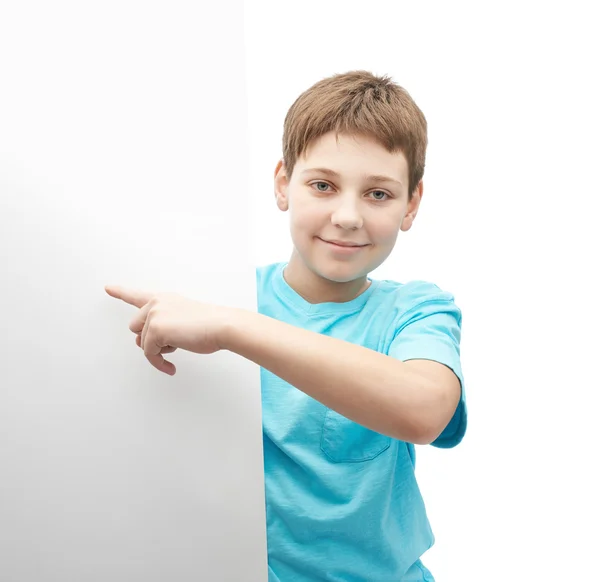 Smiling oung boy with a sheet of paper — Stock Photo, Image