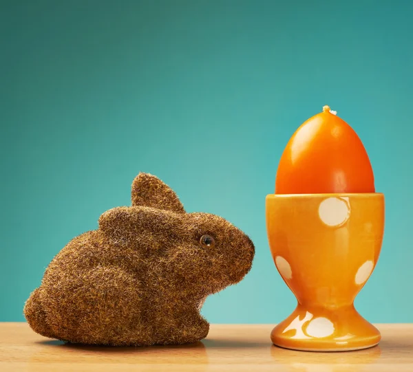 Toy rabbit next to an egg holder