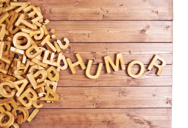 Λέξη χιούμορ με ξύλινες επιστολές — Φωτογραφία Αρχείου