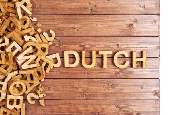 Word dutch made with wooden letters — Stock Photo, Image