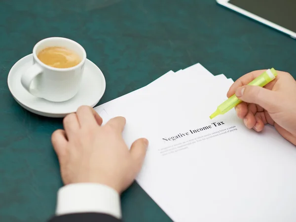 Marking words in a negative income tax definition — Stock Photo, Image