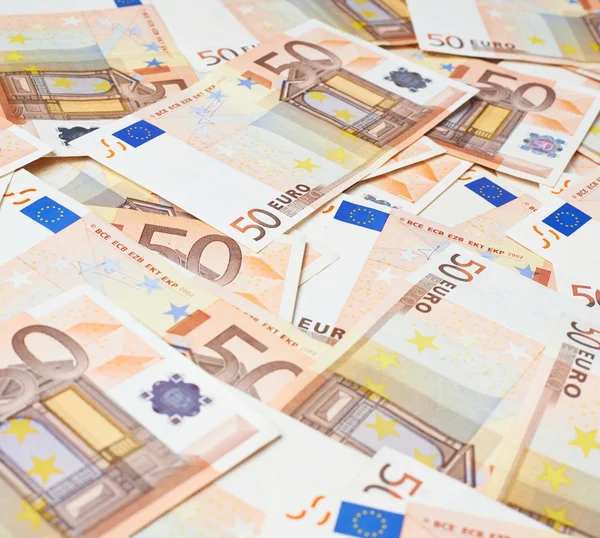 Multuplicare cinquanta banconote in euro — Foto Stock