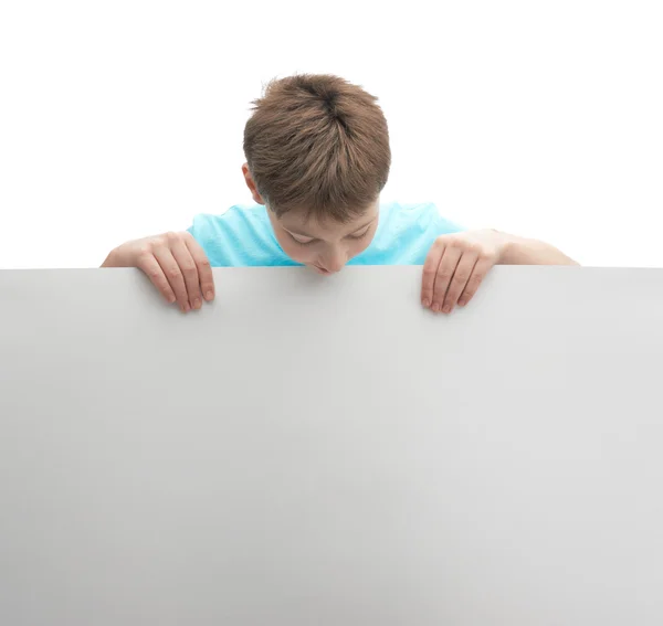 Young boy with a sheet of paper — Stock Photo, Image