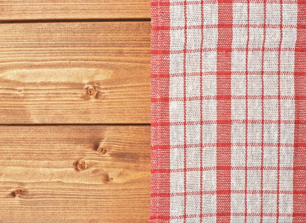 Tischdecke oder Handtuch über dem Holztisch — Stockfoto