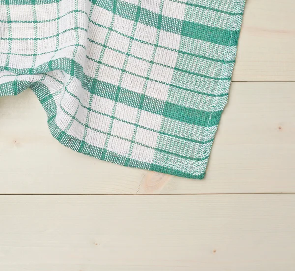 Tablecloth or towel over the wooden table — Stock Photo, Image