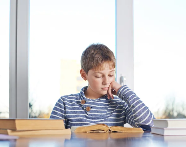 Boy reading a book — Stock Photo, Image