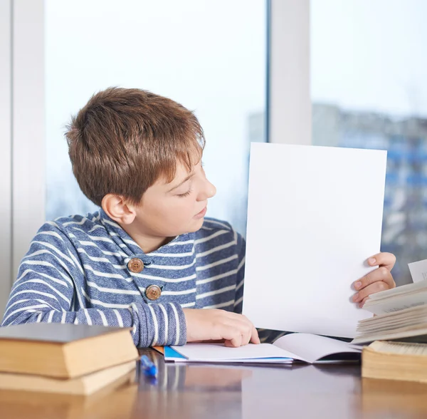 Boy   looking at the copyspace empty sheet — Stock Photo, Image