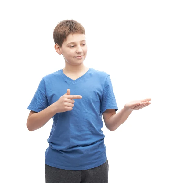 Young boy  pointing to a copyspace — Stock Photo, Image