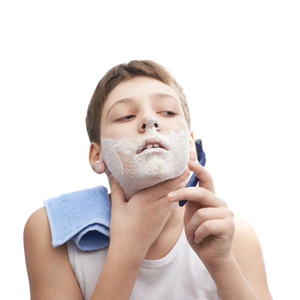 Young boy in process of shaving Stock Photo by ©exopixel 71172255