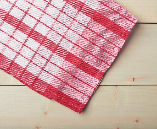 Tischdecke oder Handtuch über dem Holztisch — Stockfoto