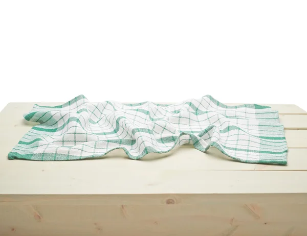 Tovaglia o asciugamano sopra il tavolo di legno — Foto Stock