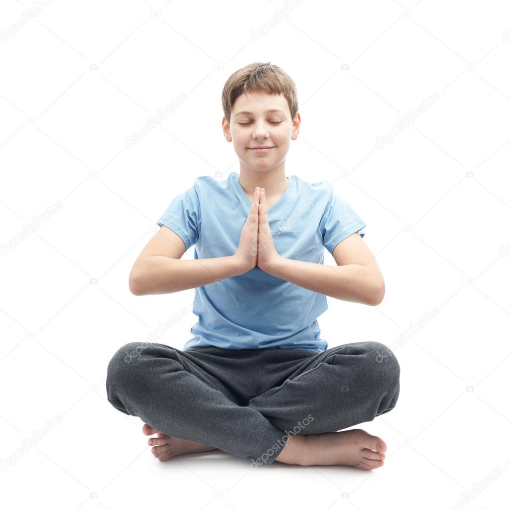 Young boy doing yoga