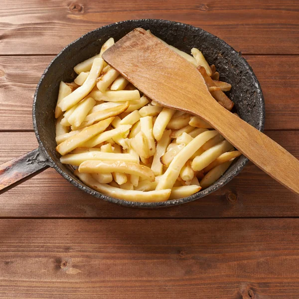Cooking fried french potatoes — Stock Image Cooking fried french potatoes Stock Photo