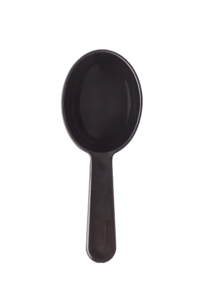 Black plastic measure spoon — Stock Photo, Image