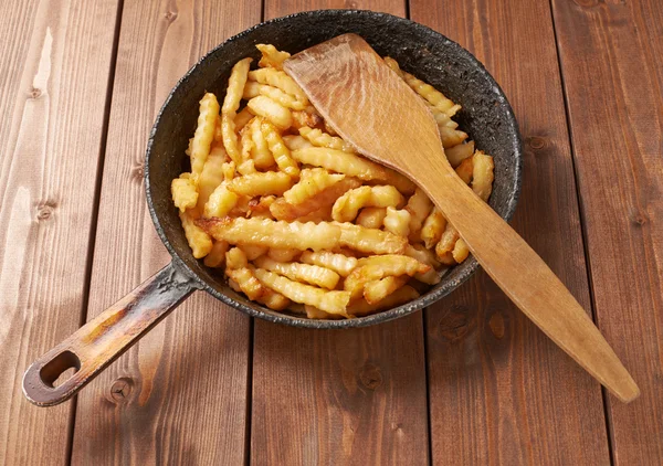 Cooking fried french potatoes — Stock Image Cooking fried french potatoes Stock Image