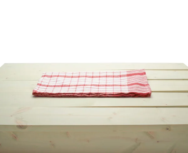 Towel over the wooden table — Stock Photo, Image