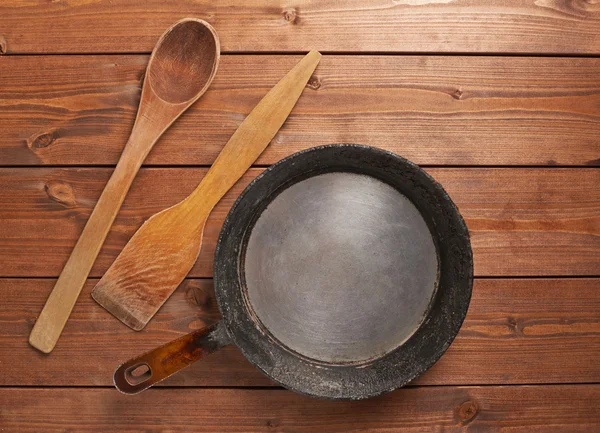 Old pan, spatula and spoon — Stock Photo, Image