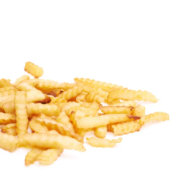 Hög med flera vågiga pommes frites — Stockfoto