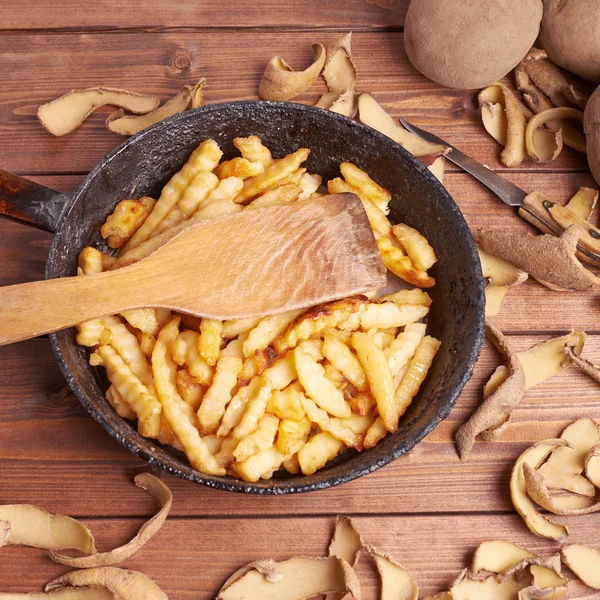 Cooking fried french potatoes — Stock Image Cooking fried french potatoes Stock Photo