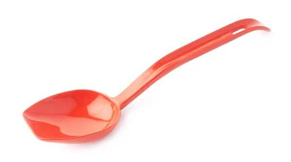 Red plastic kitchen scoop — Stock Photo, Image