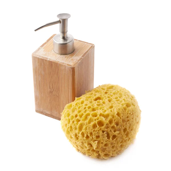 Distributeur de savon et éponge jaune — Photo