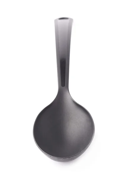 Cucchiaio mestolo da cucina in plastica nera — Foto Stock