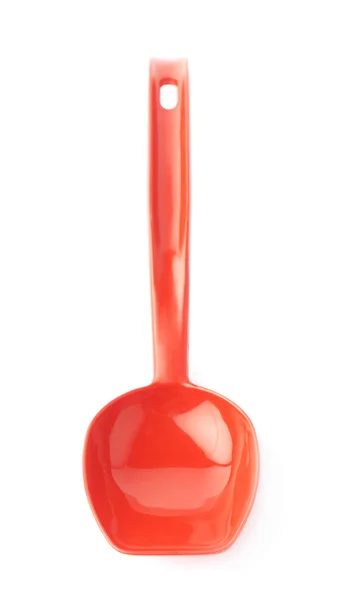 Red plastic kitchen scoop — Stock Photo, Image