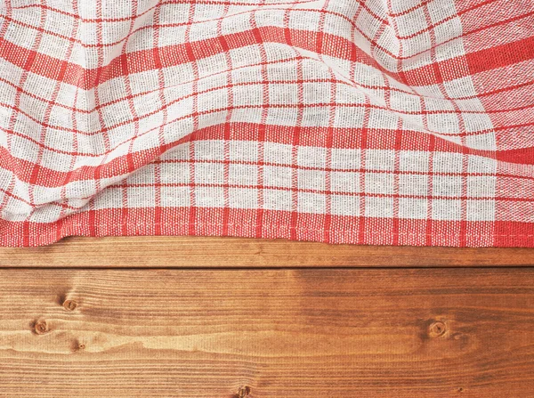 Towel over the wooden table — Stock Photo, Image