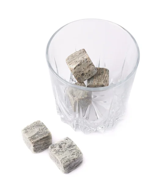 Empty tumbler filled with stones — Stock Photo, Image